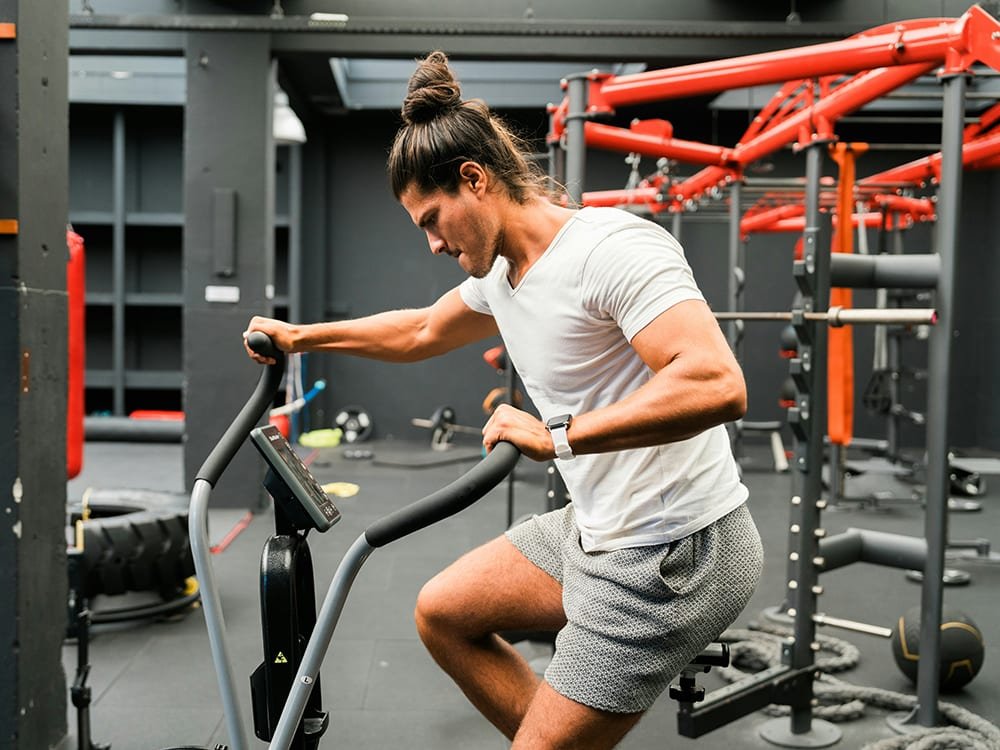 A man on an bike at a gym